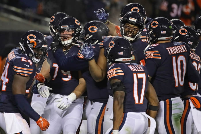 Sowell (No. 79) did get his dance in before teammates mobbed him after his touchdown on "Santa's Sleigh."